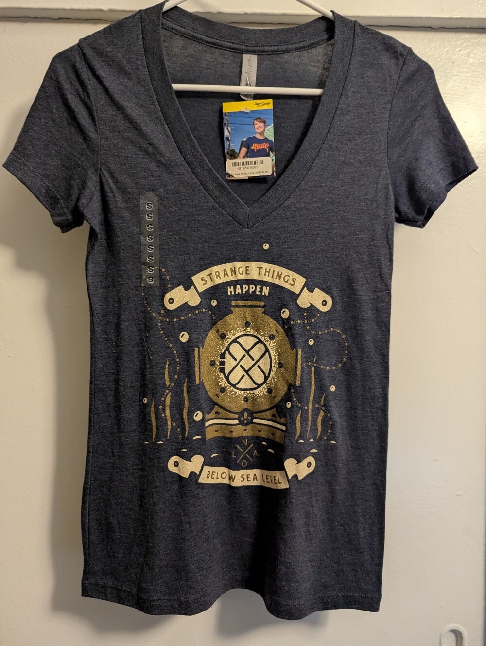 Dirty Coast Strange Things Happen Below Sea Level Graphic V-Neck Shirt